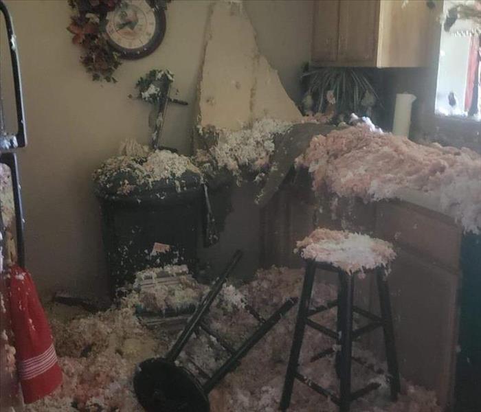 Insulation fell into the kitchen after a fire 
