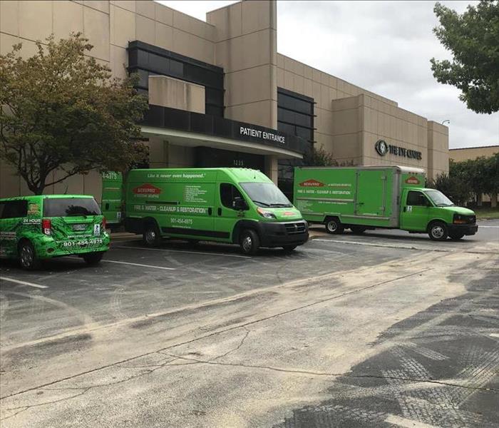 SERVPRO vehicles in front of commercial building 
