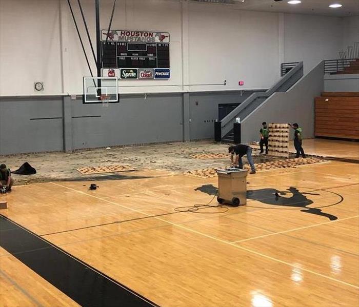 High School Basketball court water damage 