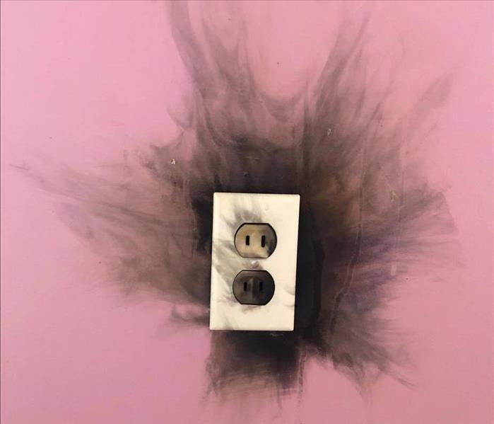 fire damage to a wall socket