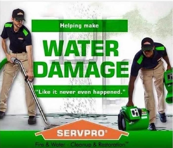 SERVPRO employees cleaning water damage 